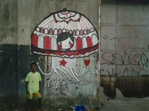 Exploring “Man oh war off love end lock” by killingwithcuteness: A Filipino Street Art Gem