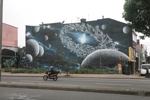 Exploring the Cosmic Murals of Shaday and Joems: “Planetas” in Bogotá