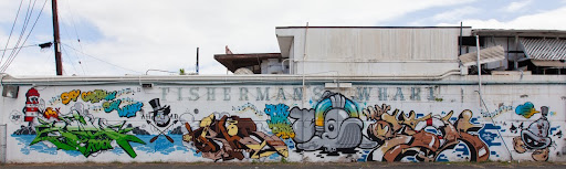 POW! WOW! Hawaii 2012 – Fisherman’s Wharf Mural: A Collaborative Masterpiece Unveiled